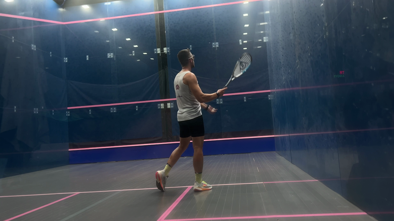 Professional squash player in action